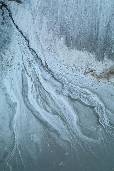 aerial abstract taken by drone of icelandic river during a winter day, Austurland, Iceland, Europe
