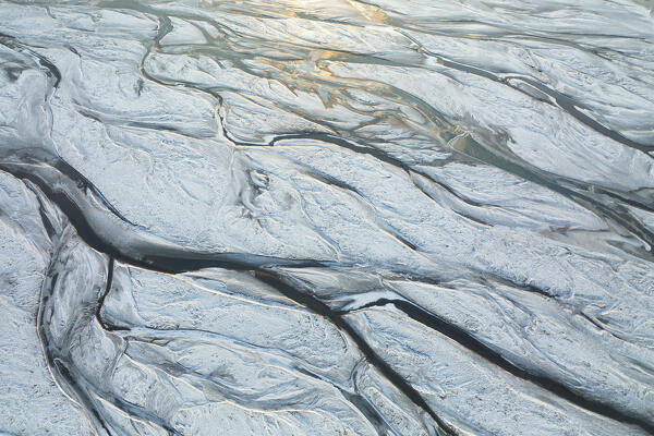 aerial abstract taken by drone of icelandic river during a winter day, Austurland, Iceland, Europe