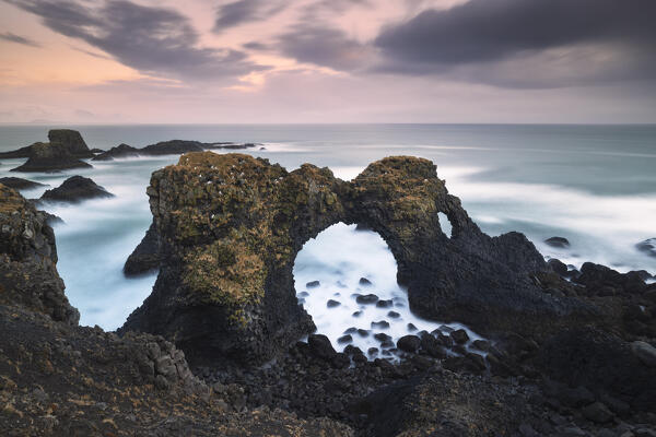 a long exposure to take a warm sunset at Gatklettur, Arnastapi, Snaefells Peninsula, Vesturland, Iceland, Europe