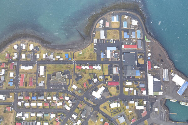 aerial vertical view of Grundafjordur taken by drone during a winter snowfall, Snaefells Peninsula, Vesturland, Iceland, Europe