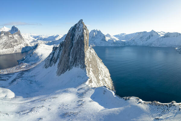 Aerial view taken from the drone of iconic Segla mountain during a sunny winter day, Senja, Norway, Europe