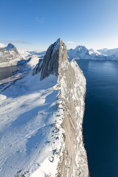 Aerial view taken from the drone of iconic Segla mountain during a sunny winter day, Senja, Norway, Europe