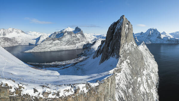 Aerial view taken from the drone of iconic Segla mountain during a sunny winter day, Senja, Norway, Europe