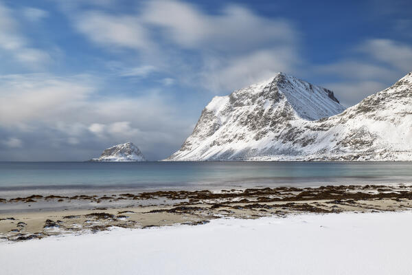 a long exposure to capture the afternoon light at Haukland beach during an winter day, Vestvagoy, Lofoten island, Norway, Europe