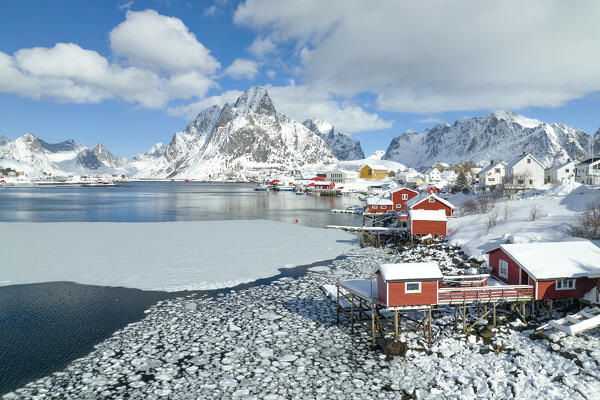 Winter day in Reine village with mountain peak covered with snow, Lofoten Islands, Norway, Europe