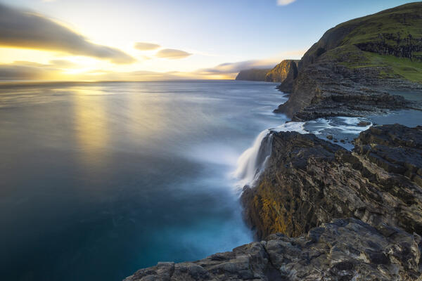 Bøsdalafossur waterfall from Sørvagsvatn at sunset, Vagar, Faroe Islands, Denmark, Scandinavia