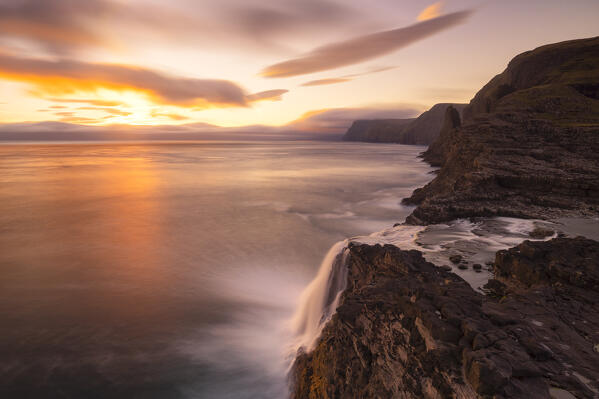 Bøsdalafossur waterfall from Sørvagsvatn at sunset, Vagar, Faroe Islands, Denmark, Scandinavia