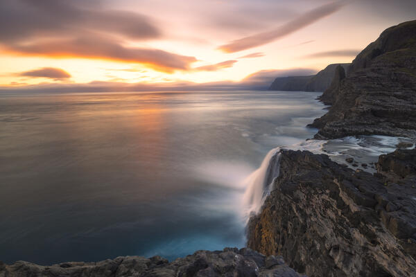 Bøsdalafossur waterfall from Sørvagsvatn at sunset, Vagar, Faroe Islands, Denmark, Scandinavia