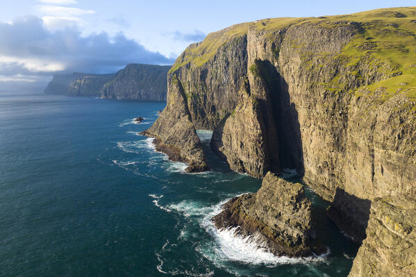 aerial panoramic view taken by drone of the cliffs near to Sørvagsvatn during an autumn day, Vagar, Faroe Islands, Denmark, Scandinavia
