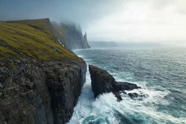 aerial view, taken by drone of Trollkonufingur or Witches Finger, Sandavagur, Vagar, Faroe Islands, Denmark, Scandinavia, Europe