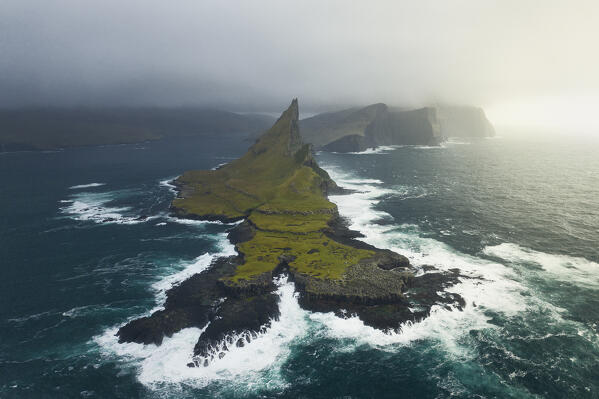 aerial view taken by drone of Tindholmur islands during an autumn day, Sorvagur, Faroe Island, Europe