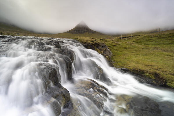 The mountain and waterfall near Gjogv, Sunda municipality, Eysturoy, Faroe Islands, Denmark, Scandinavia, Europe