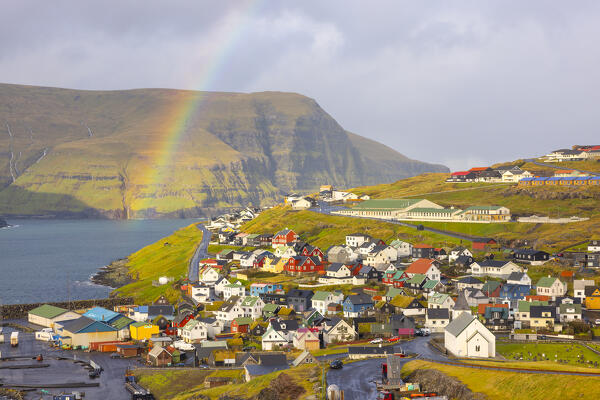 a little village called Eidi under a big rainbow during an autumn day, Eysturoy, Faroe Islands, Denmark, Scandinavia, Europe