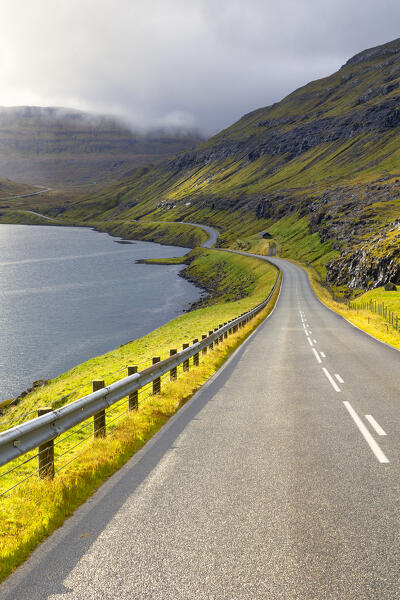 view of the road along the Funningsfjordur, Eysturoy, Faroe Island, Denmark, Europe