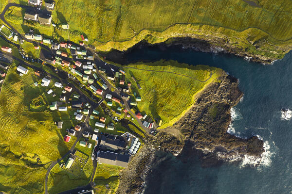 aerial vertical view taken by drone of little village called  Gjogv during an autumn day, Eysturoy, Faroe Island, Denmark, Europe