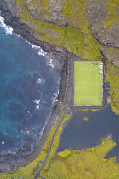 aerial vertical view taken by drone of football court near to Eidi village, Eysturoy, Faroe Island, Denmark, Europe