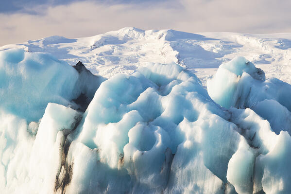 an iceberg in the Jokusarloon glacier lagoon during an autumn day, Iceland, Europe