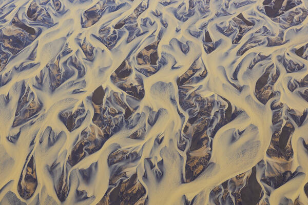 aerial abstract view taken by drone of icelandic river during a summer day, Southern Iceland, Europe