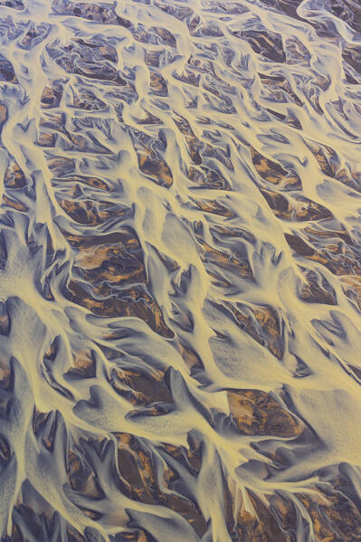 aerial abstract view taken by drone of icelandic river during a summer day, Southern Iceland, Europe