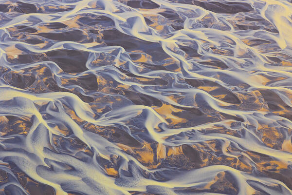 aerial abstract view taken by drone of icelandic river during a summer day, Southern Iceland, Europe