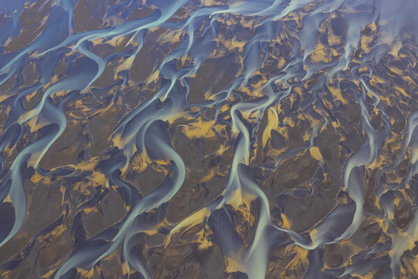 aerial abstract view taken by drone of icelandic river during a summer day, Southern Iceland, Europe