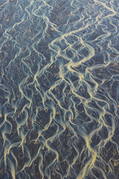 aerial abstract view taken by drone of icelandic river during a summer day, Southern Iceland, Europe