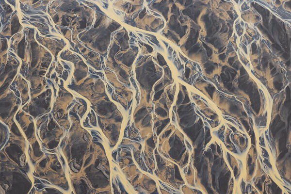 aerial abstract view taken by drone of icelandic river during a summer day, Southern Iceland, Europe