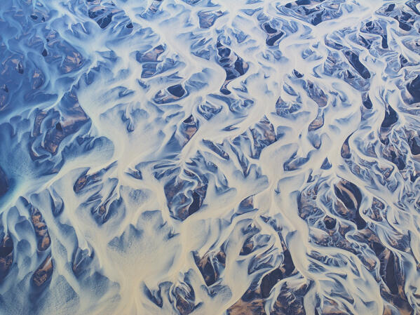 aerial abstract view taken by drone of icelandic river during a summer day, Southern Iceland, Europe