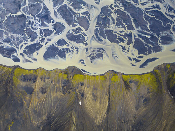 aerial abstract view taken by drone of icelandic river during a summer day, Southern Iceland, Europe
