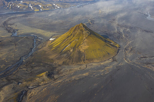 aerial view shooted by airplane of Maelifell mountain during a summer sunny day, Iceland, Europe