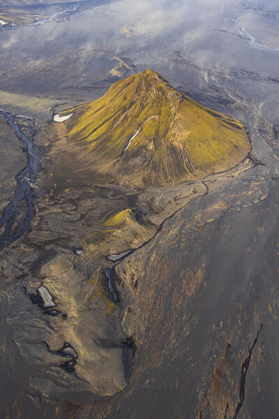 aerial view shooted by airplane of Maelifell mountain during a summer sunny day, Iceland, Europe