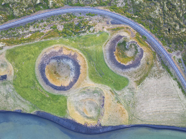 aerial vertical view of old volcano and ashpalt road, near to Myvatn lake during a summer day, Iceland, Europe