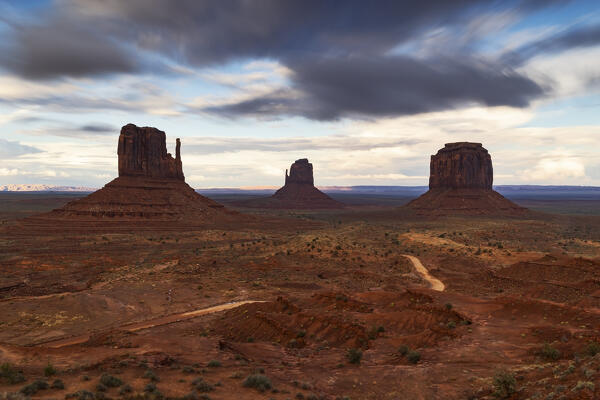 a beautiful light envelope the Monument Valley during a summer sunset, Arizona, United States of America