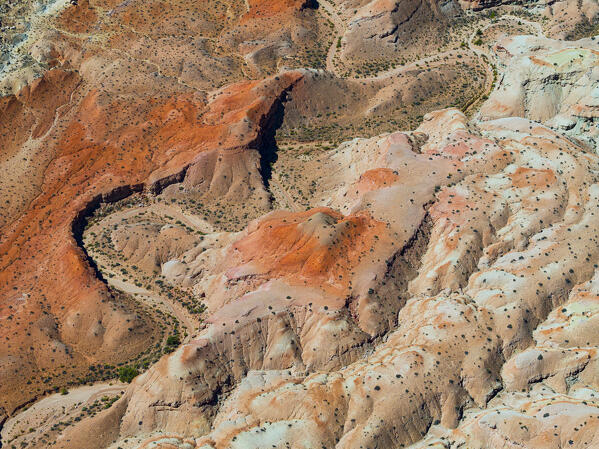 aerial abstract view taken by drone of desert area near to Goblin Valley National Park during a sunny summer day, Utah, United States of America
