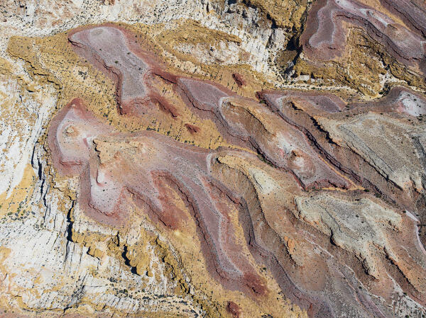 aerial abstract view taken by drone of desert area near to Goblin Valley National Park during a sunny summer day, Utah, United States of America