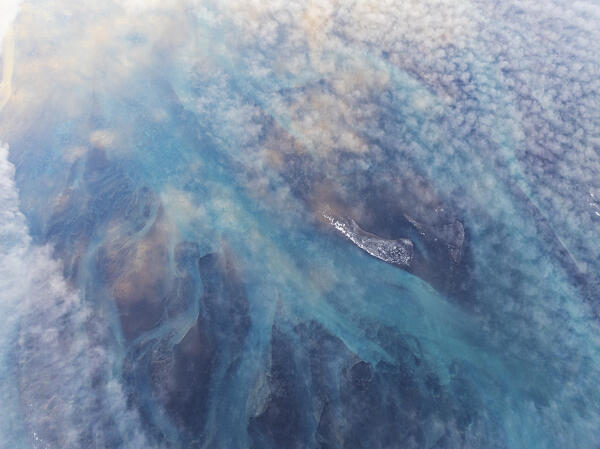 aerial view taken by drone of icelandic river, close to Southern coast, during an cold winter day, Iceland, Europe