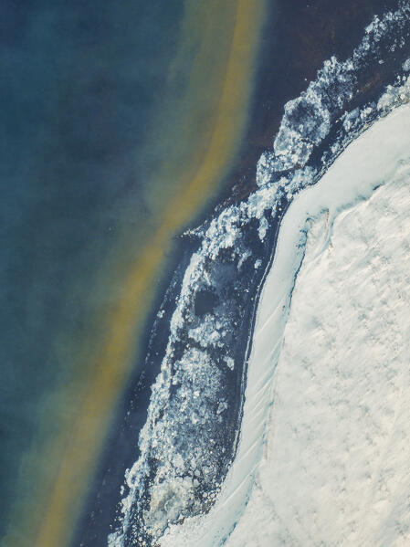aerial view taken by drone of icelandic river, close to Southern coast, during an cold winter day, Iceland, Europe