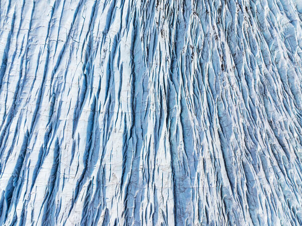 aerial drone view of particular textures formed in the Svinafellsjokull glacier following global warming, Iceland, Europe