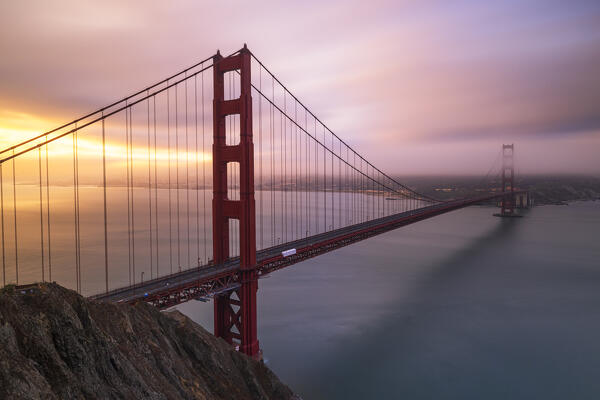 the beautiful Golden Gate Bridge illuminated by the first light of dawn, San Francisco, California, United States of America