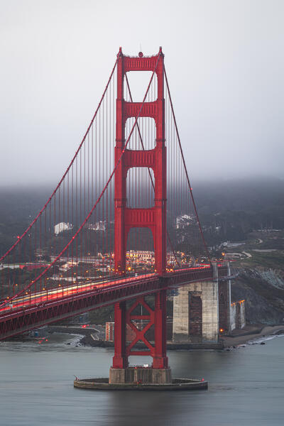 the beautiful Golden Gate Bridge illuminated by lights during the dusk, San Francisco, California, United States of America