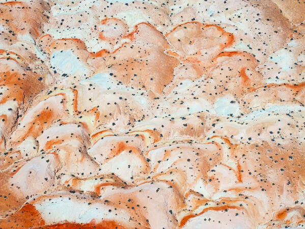 aerial view taken by drone of the beautiful desert road near to Goblin State Park during a summer day, Hanksville, Utah, United States of America