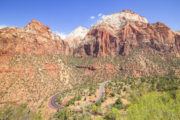 a car drive along the scenis road on the Zion National Park during a sunny summer day, Utah, United States of America