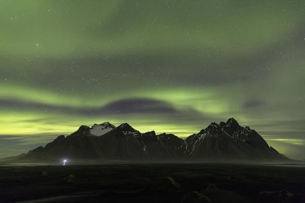 Vestrahorn mountain and the Northen Lights, Stokksnes, Hofn, Eastern Iceland, Iceland, Europe.