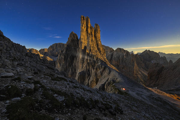 A man with his tent at Vajolet Tower during night, Gruppo del Catinaccio, Dolomiti di Gardena, Bolzano, Trentino Alto Adige, Italy, Southern Europe (MR)