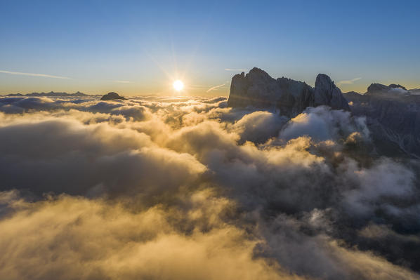 Aerial view of sunrise and low clouds at Seceda, Gruppo delle Odle, Dolomiti di Gardena, Bolzano, Trentino Alto Adige, Italy, Southern Europe