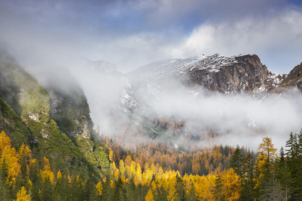 Mountains around Braies lake during autumn at sunrise, Braies, Bolzano, Trentino Alto Adige, Italy, Western Europe