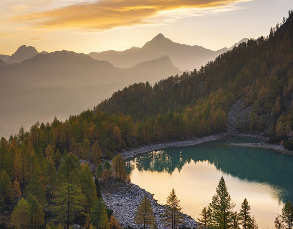 Pizzo Scalino from Lagazzuolo lake at sunrise during autumn, Valtellina, Valmalenco, Sondrio, Lagazzuolo Alp, Lombardy, Italy, Europe