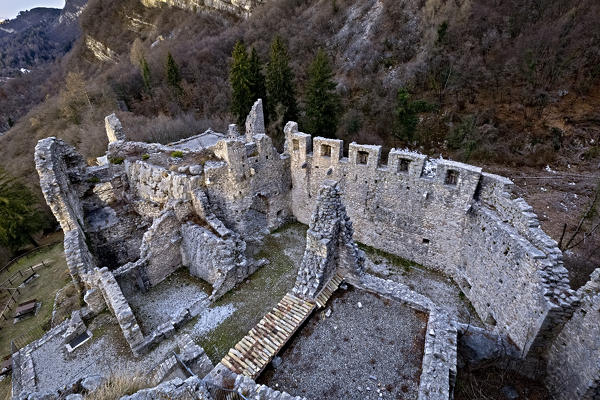 Ruins of the medieval walls of Corno Castle. Isera, Trento province, Trentino Alto-Adige, Italy, Europe.