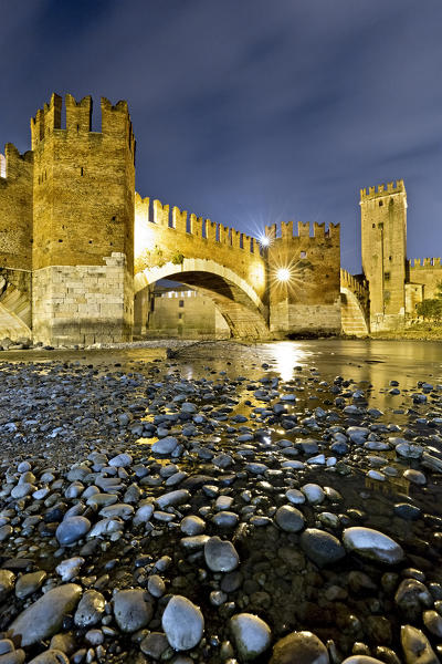 The bank of the river Adige at the Castelvecchio and the Scaligero bridge. Verona, Veneto, Italy, Europe.