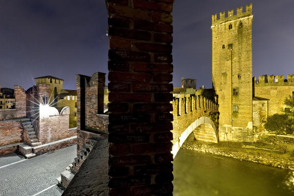 The Scaligero bridge and the Castelvecchio at night. Verona, Veneto, Italy, Europe.